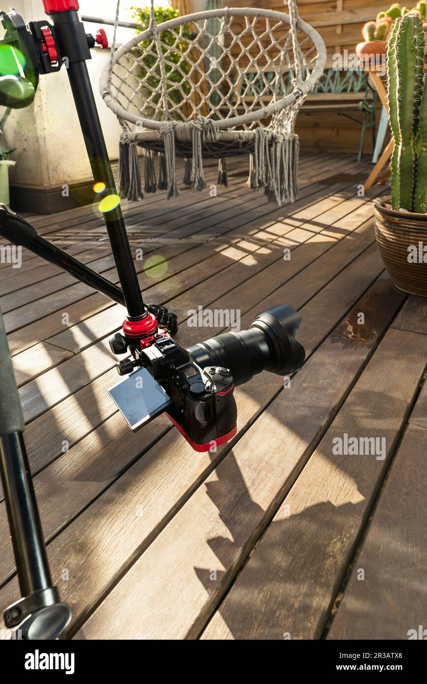 A tripod with an articulated arm to place a camera in any position to take pictures Stock Photo