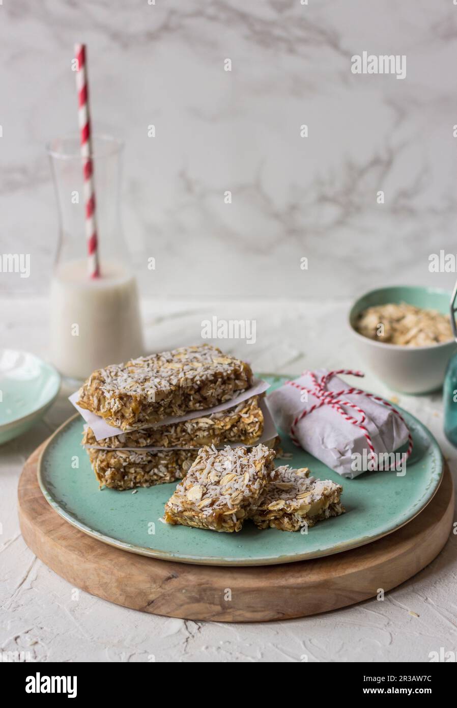 Homemade muesli bars from nuts and dried fruits with oats, milk in a