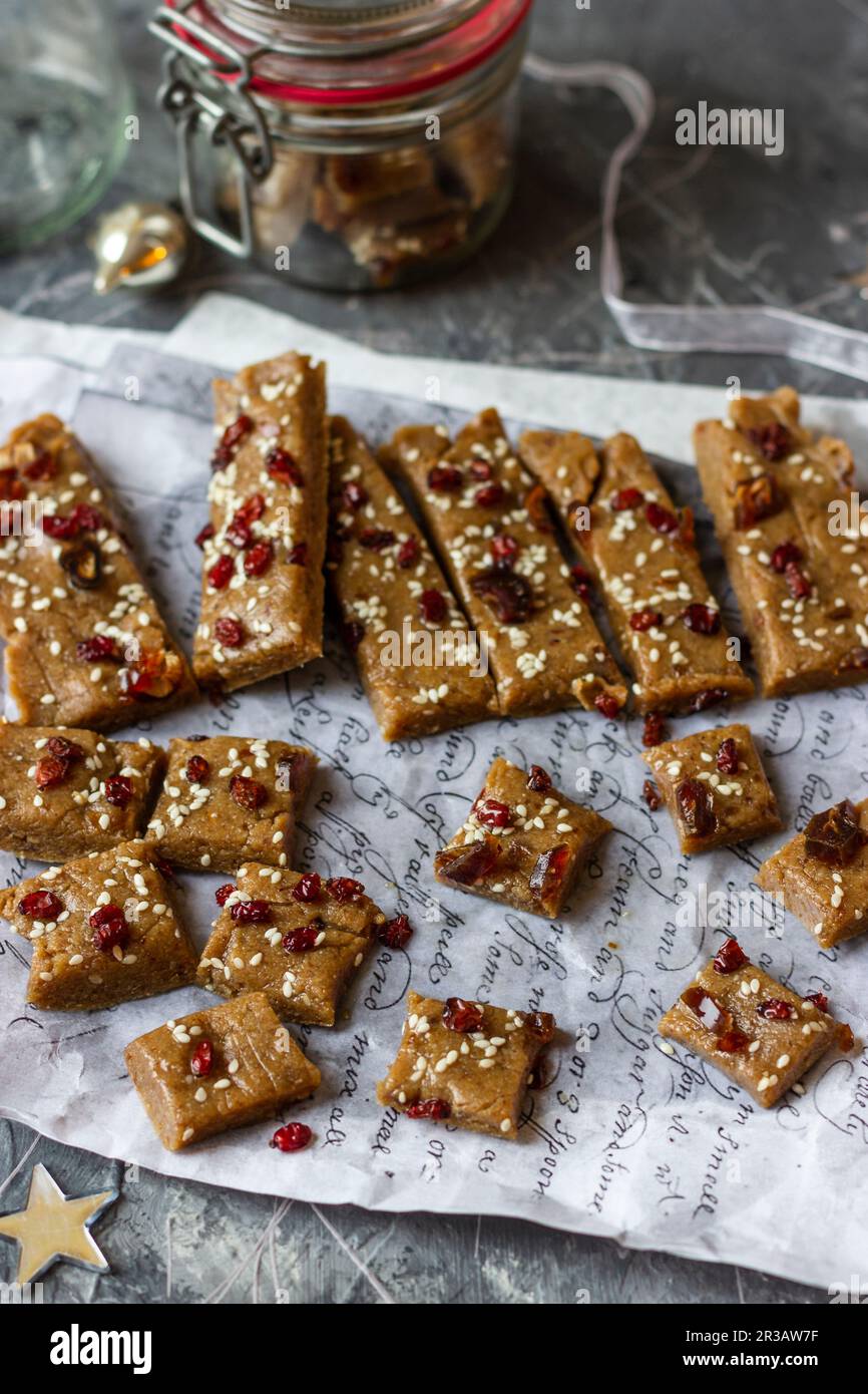 Tahini and dates homemade bars with sesame seeds and cranberry Stock Photo