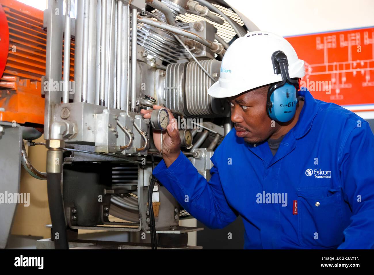 Electrical Engineer checking gauge equipment Stock Photo Alamy