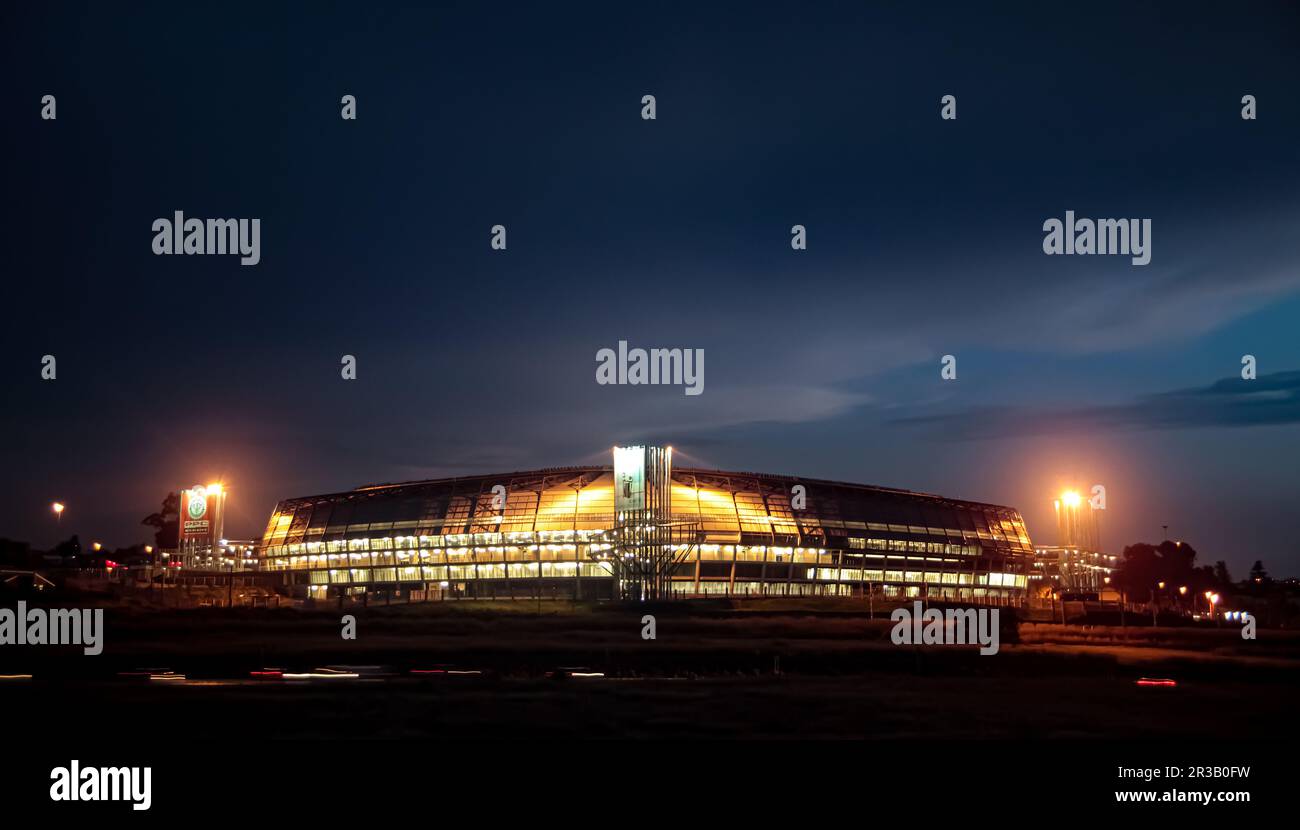 Orlando Soccer Stadium in Soweto at night Stock Photo