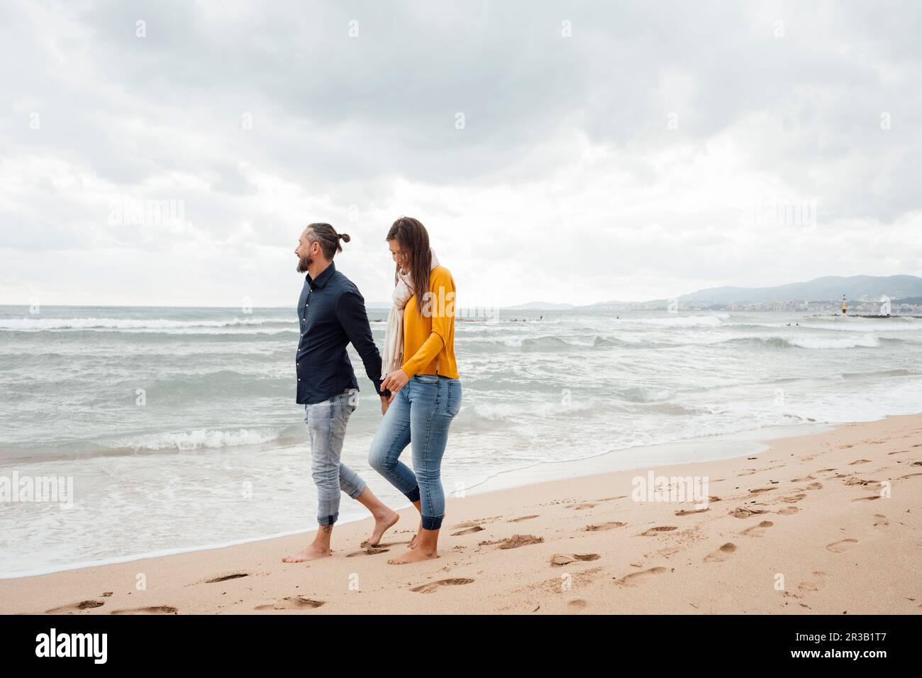 Man woman walking together man hi-res stock photography and images - Alamy