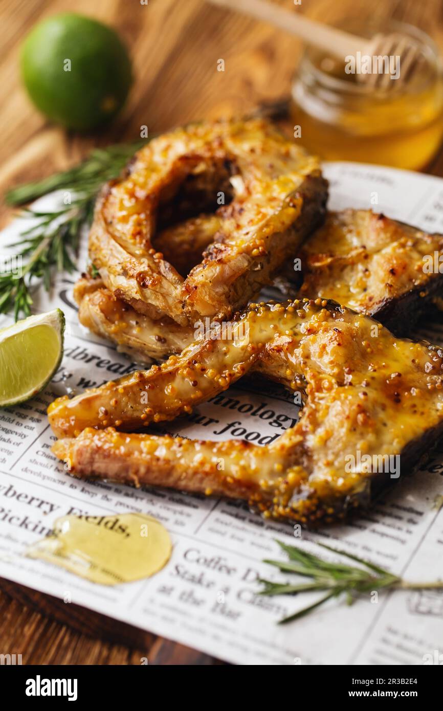 Carp baked in honey mustard sauce. Fried Slices of Big River Fish