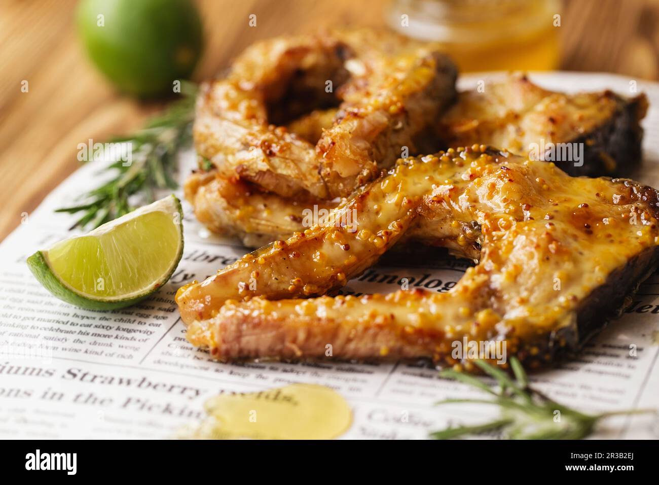 Carp baked in honey mustard sauce. Fried Slices of Big River Fish
