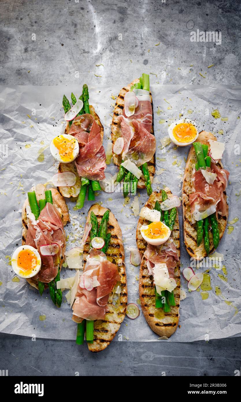 Sourdough bread with Asparagus, Egg and Ham Stock Photo