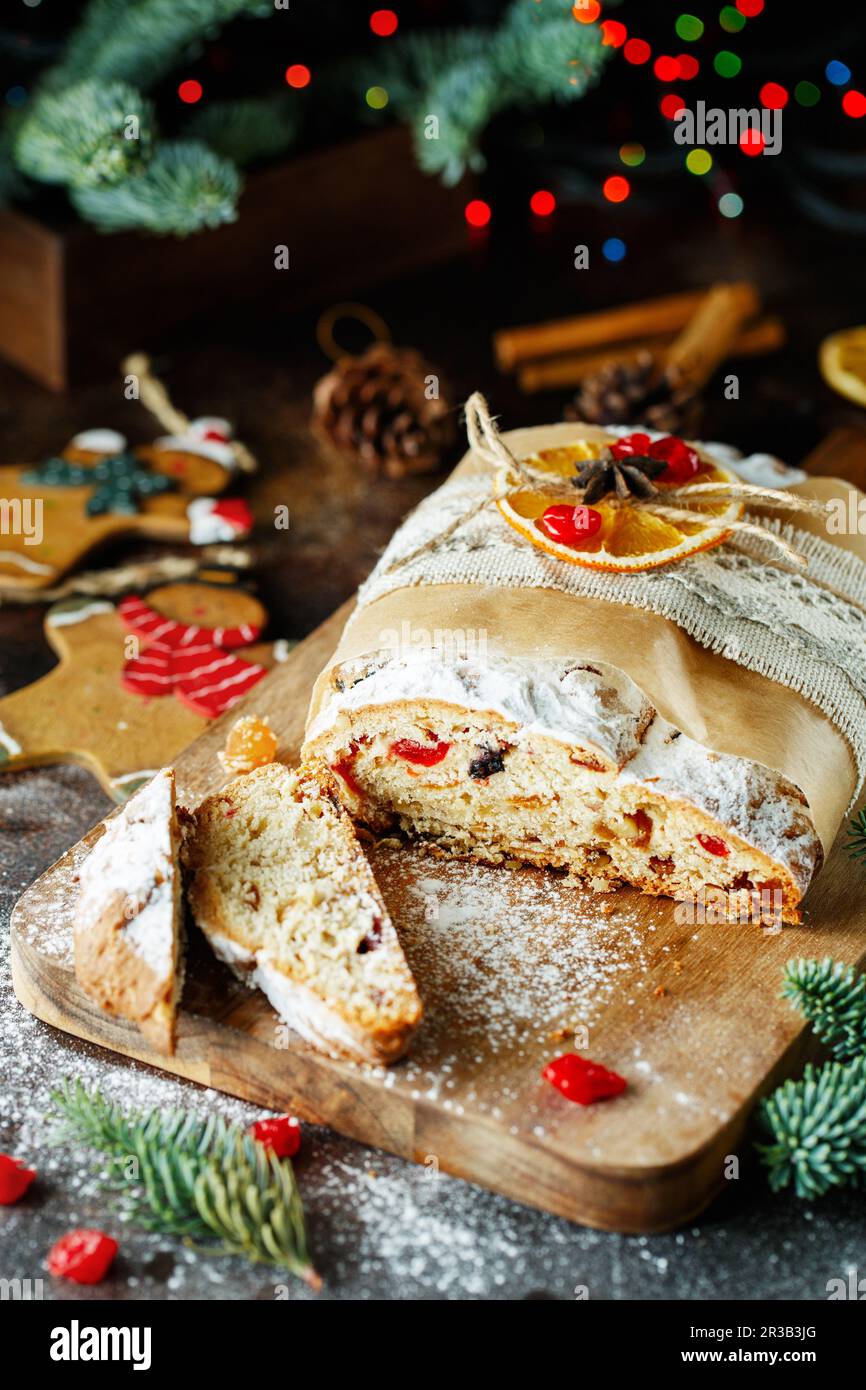 Holiday baking. Christmas cake. Stollen is fruit bread of nuts, spices