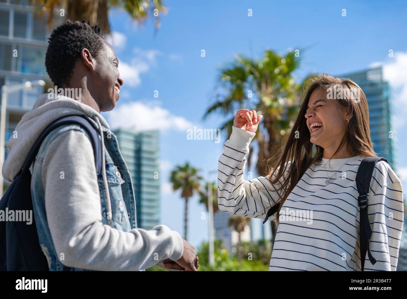 Man laughing with friends hi-res stock photography and images - Alamy