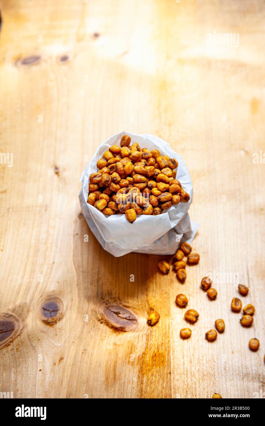 A bag of deepfried salted corn kernels Stock Photo Alamy
