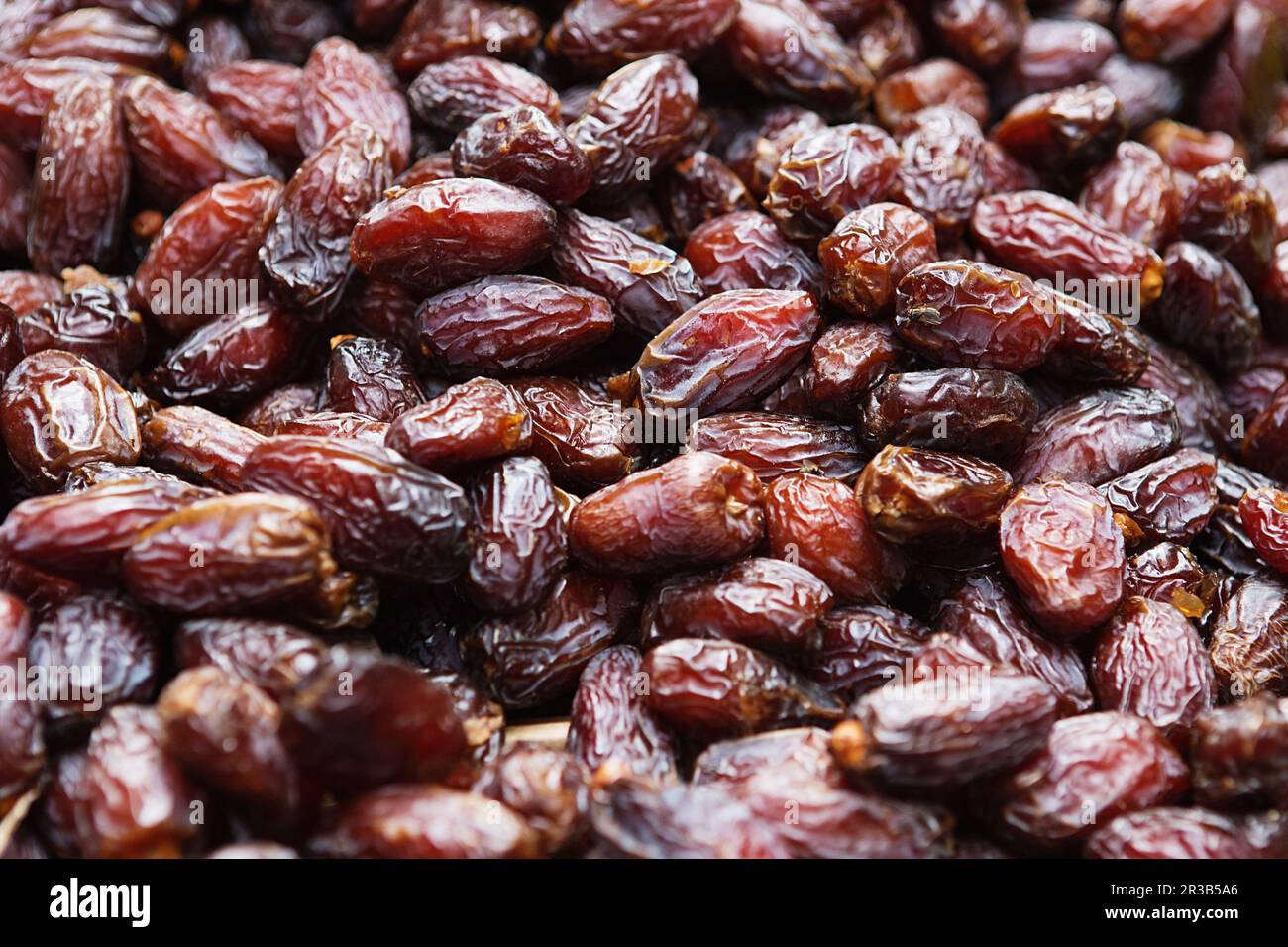 Background of dried dates fruit, at the open air market Stock Photo