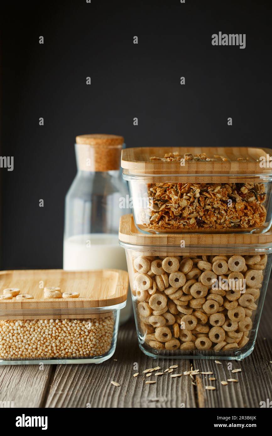 Breakfast cereal. Glass boxes with granola, cereal rings and Quinoa