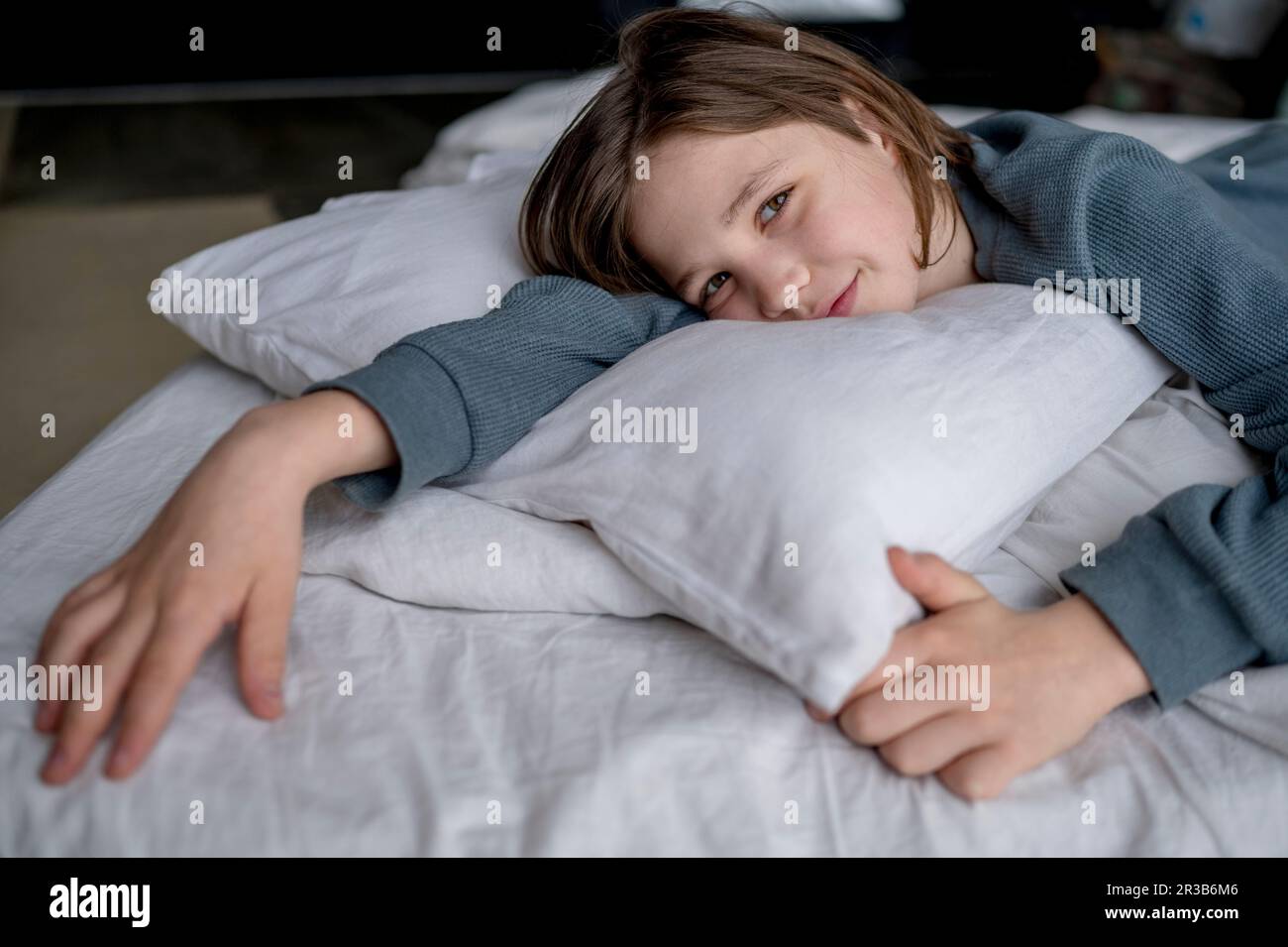 Boy at home relaxing hi-res stock photography and images - Alamy