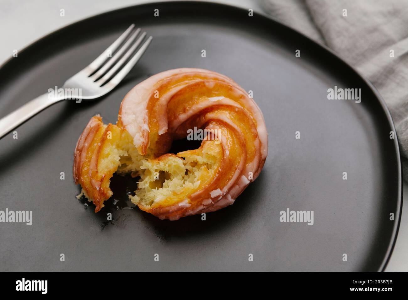 Gourmet French Cruller donut Stock Photo