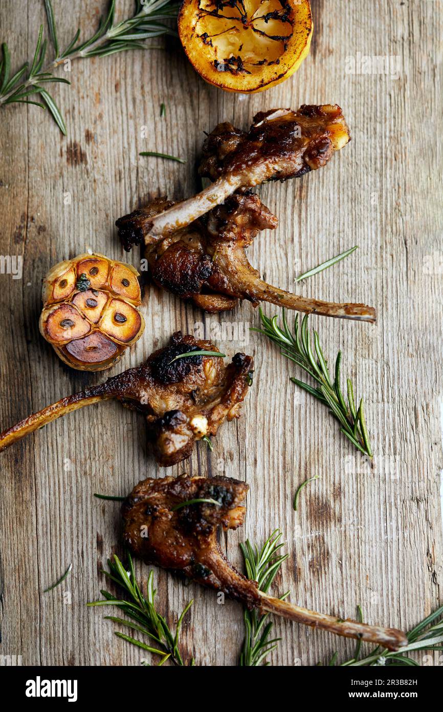 Roast lamb chops with rosemary and garlic Stock Photo Alamy