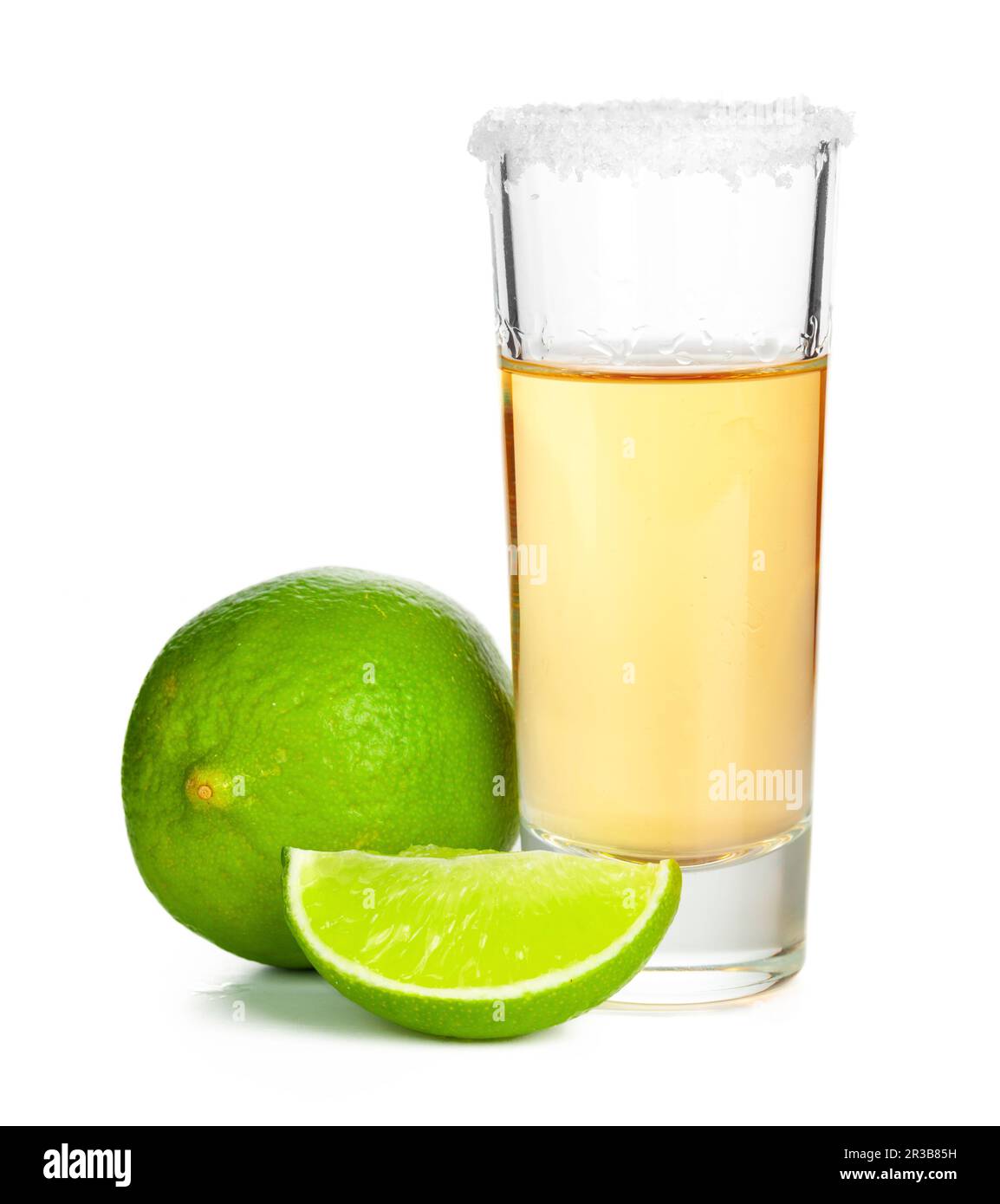 Shot of tequila with a slice of lime no white background Stock Photo ...