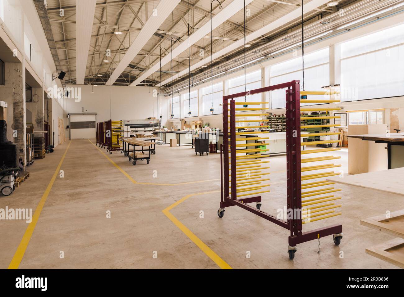 Trolley with racks in modern carpentry factory Stock Photo - Alamy