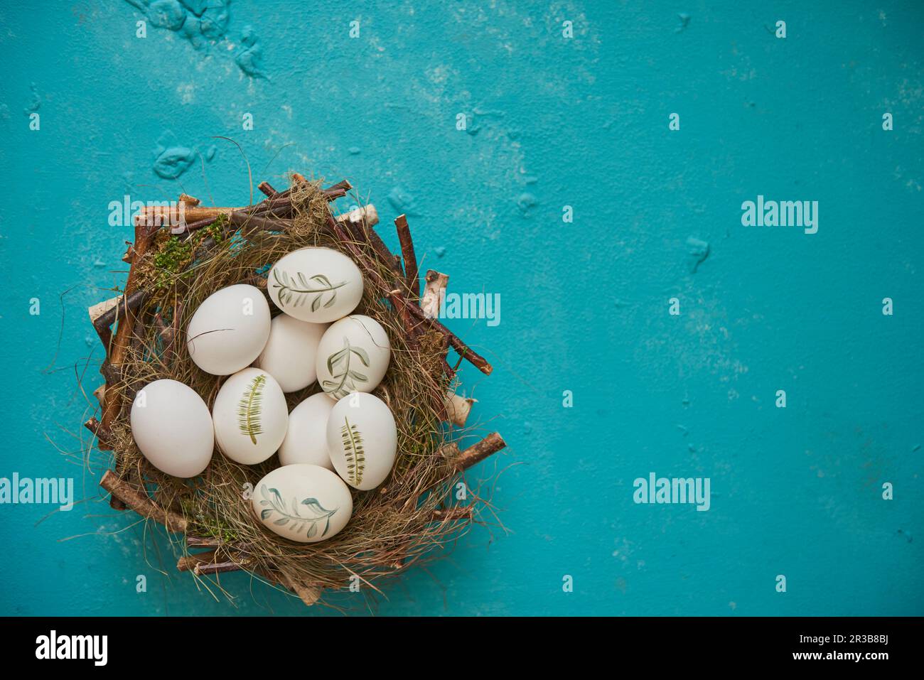 Painted Easter eggs in an Easter basket Stock Photo