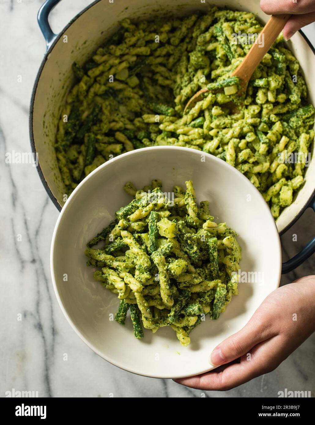 Gemelli with pesto potatoes and green beans Stock Photo