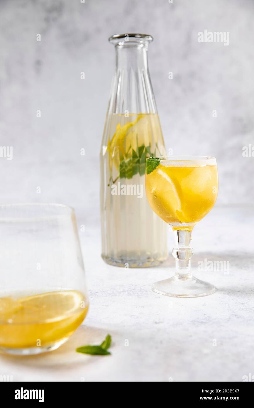 Cold peppermint tea with lemon in a glass bottle Stock Photo Alamy