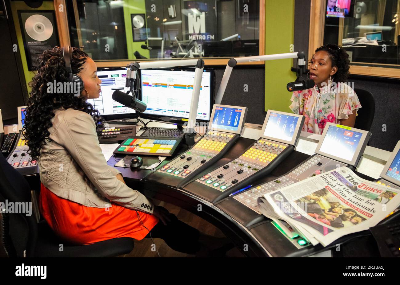 African Female Guests being interviewed on live talk radio show Stock Photo