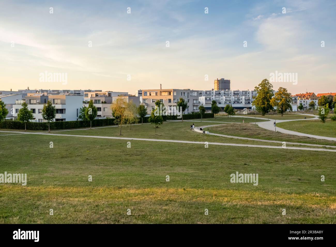 Germany, Bavaria, Augsburg, Grassy area in front of new modern suburban