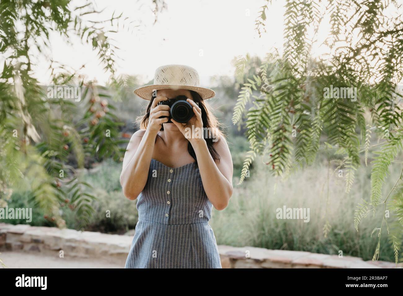 Photographing standing holding hi-res stock photography and images - Alamy