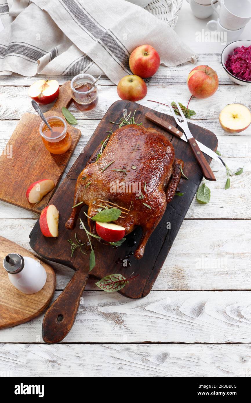 Roasted duck with apples Stock Photo Alamy