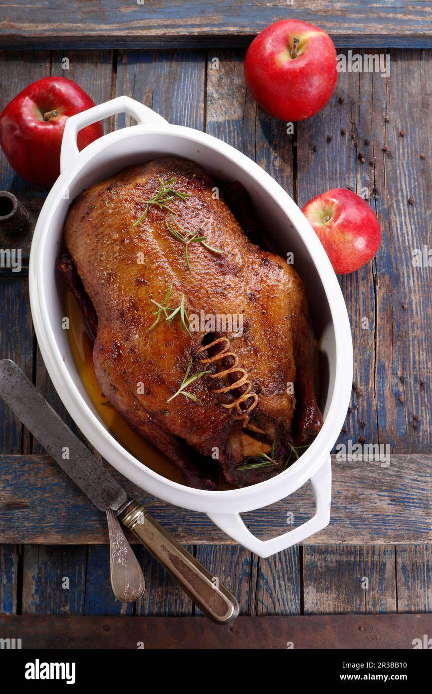 Roasted duck with apple stuffing Stock Photo Alamy