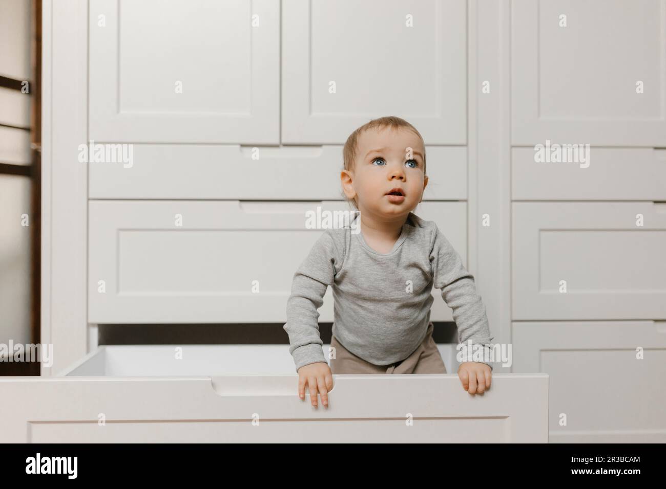 Clothes hangers child wardrobe hi-res stock photography and images - Alamy