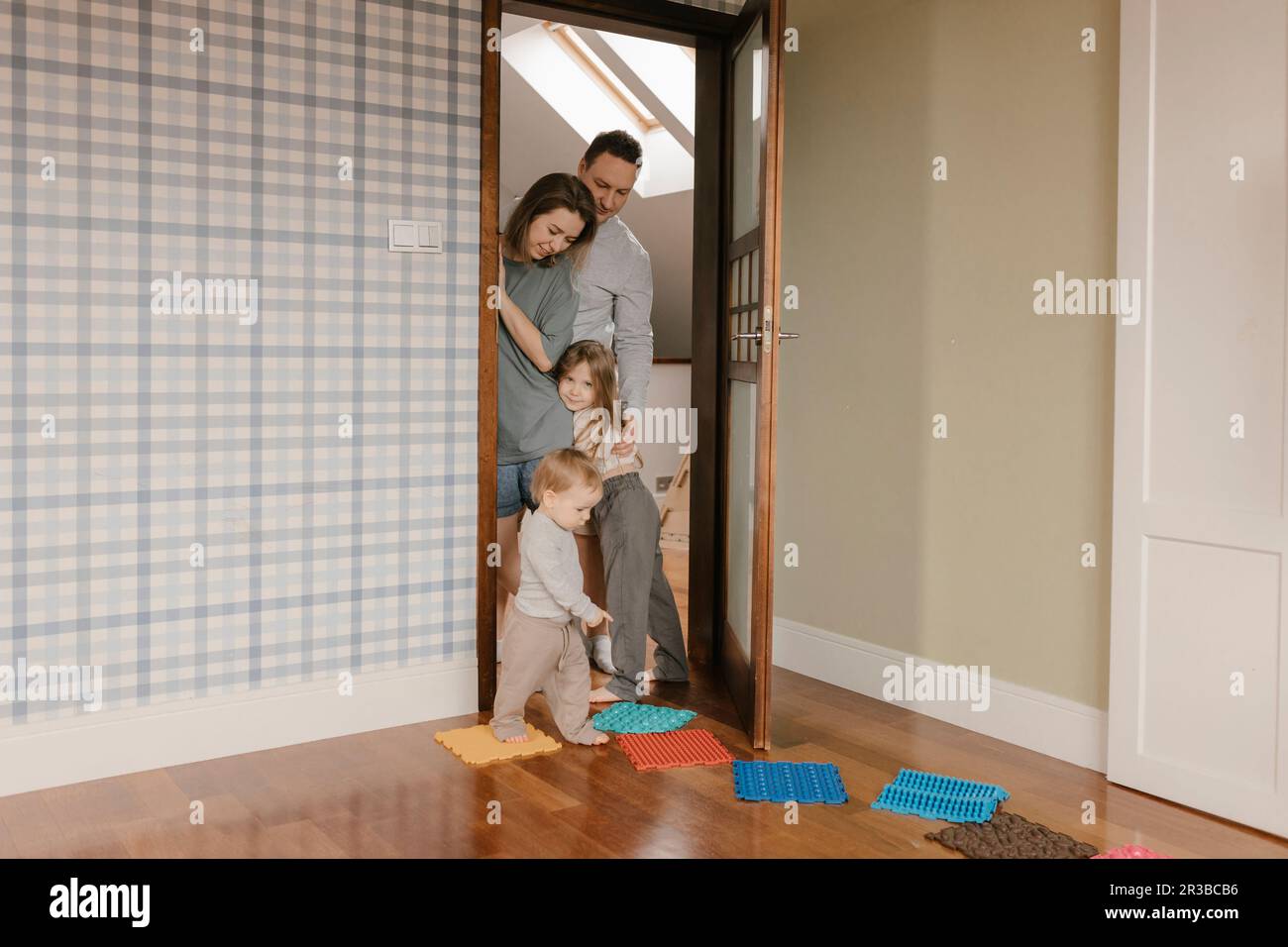 Family spending leisure time together at home Stock Photo
