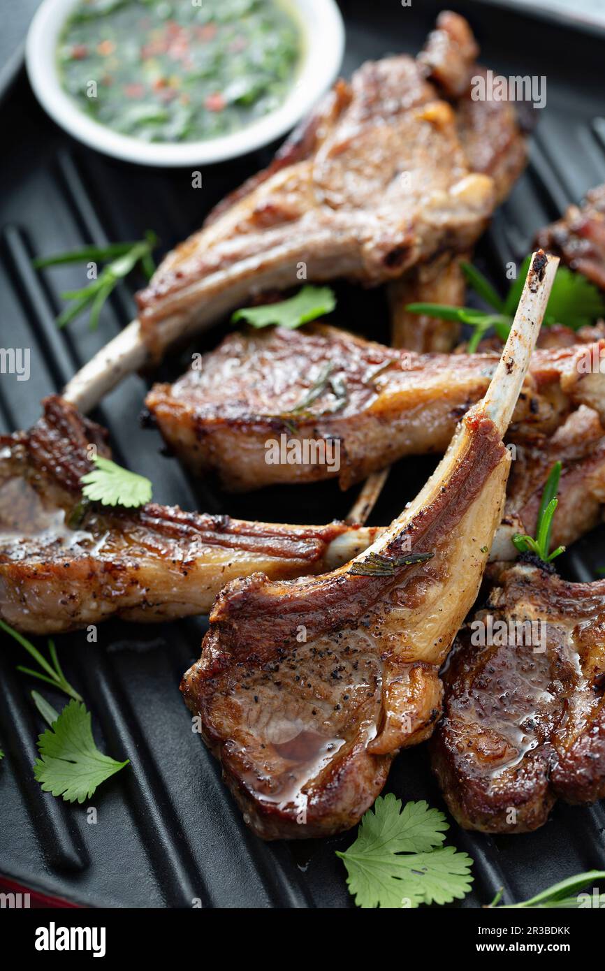 Grilled lamb chops with chimichurri sauce Stock Photo - Alamy