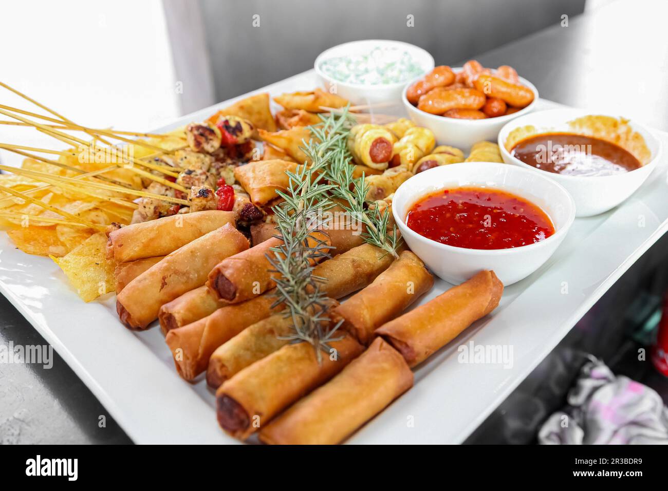 Spring Rolls and dip on a white plate Stock Photo