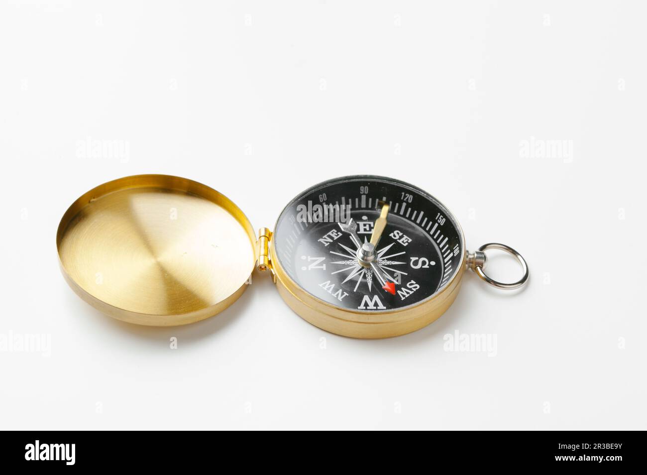 Golden vintage compass isolated on white background Stock Photo - Alamy