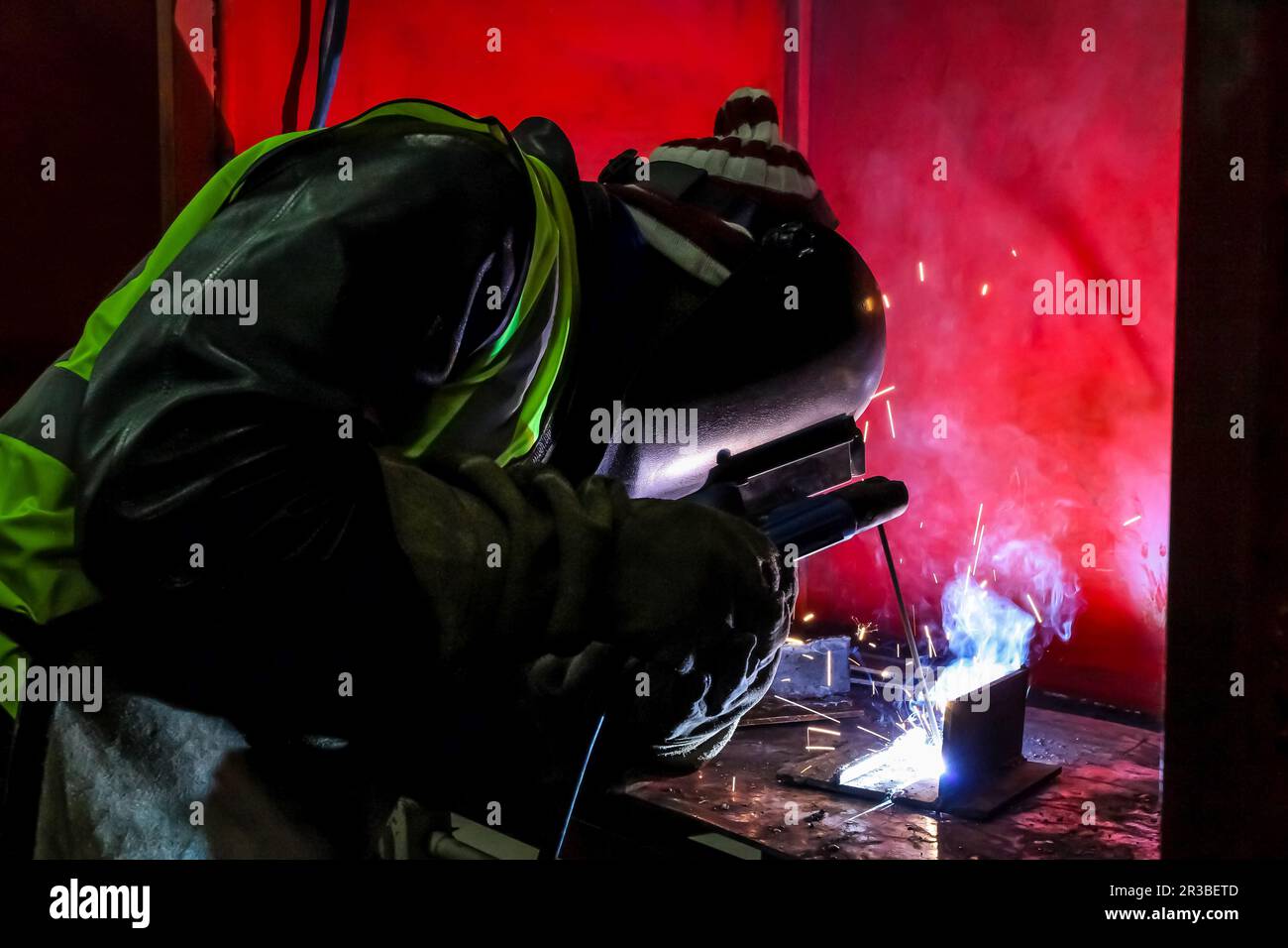 Man welding metal in a workshop Stock Photo