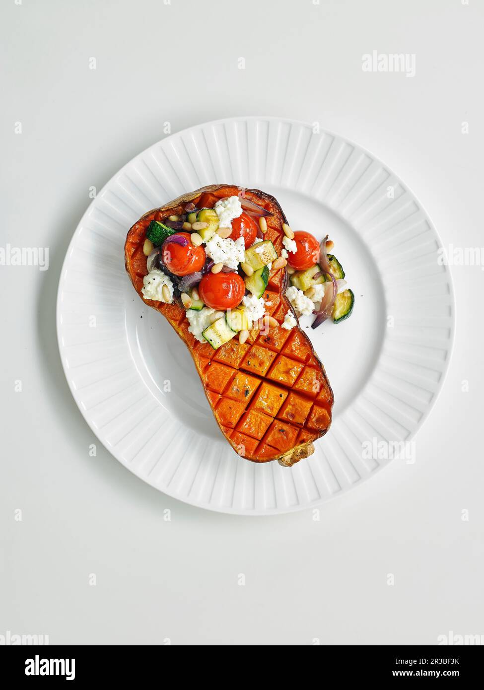 Stuffed butternut halves Stock Photo