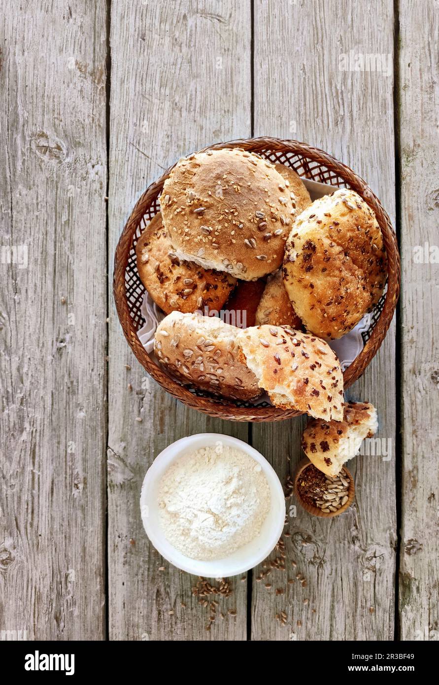 Various seeded rolls in a bread basket Stock Photo