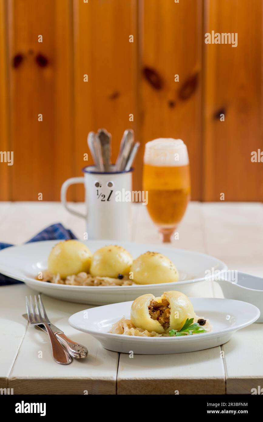 Gram dumplings on sauerkraut Stock Photo - Alamy