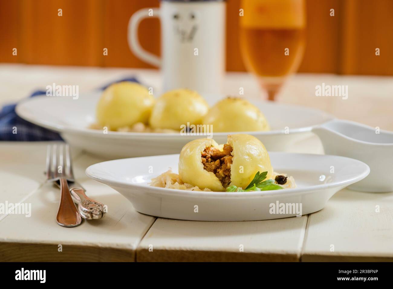 Gram dumplings on sauerkraut Stock Photo