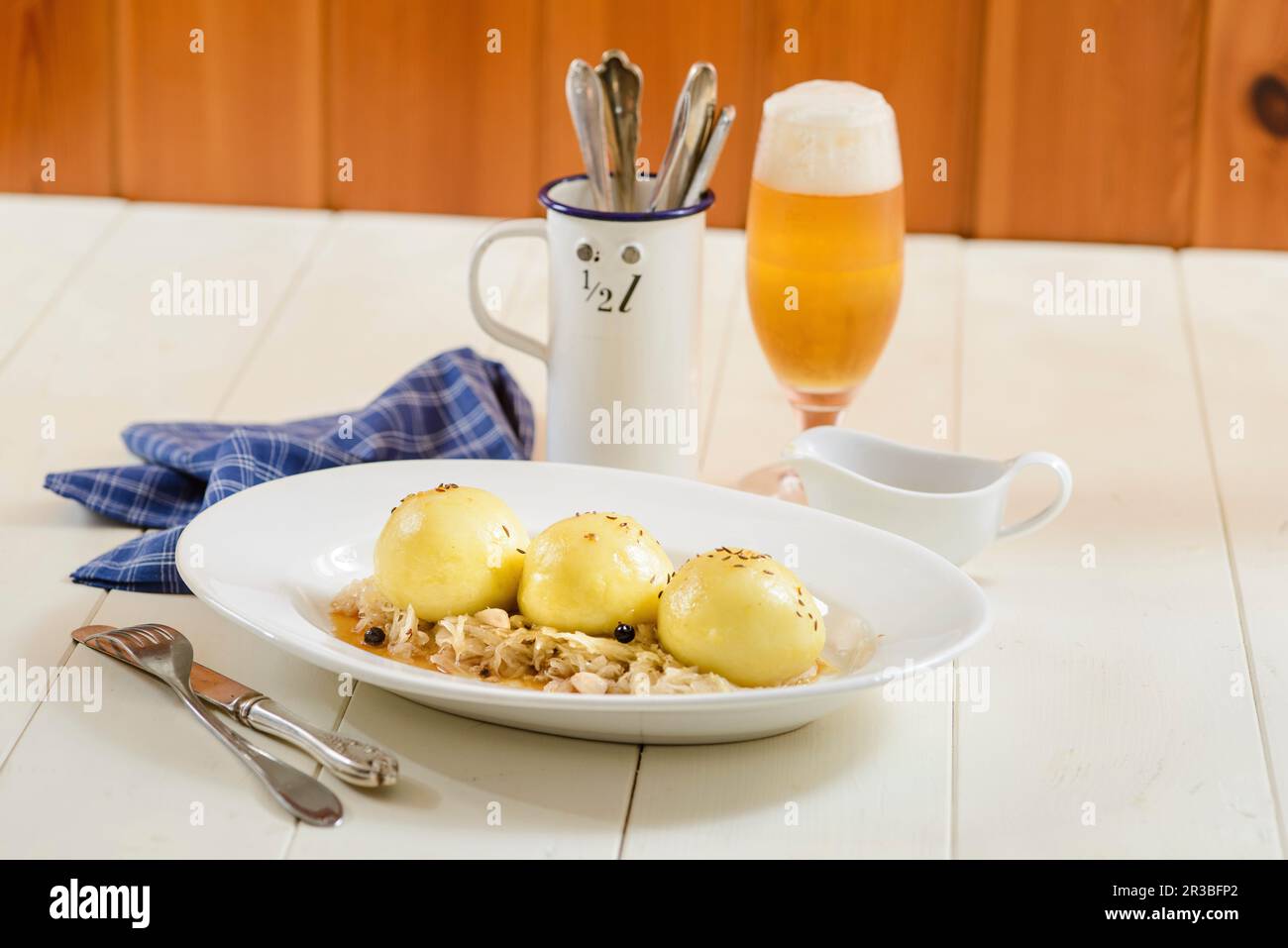 Gram dumplings on sauerkraut Stock Photo