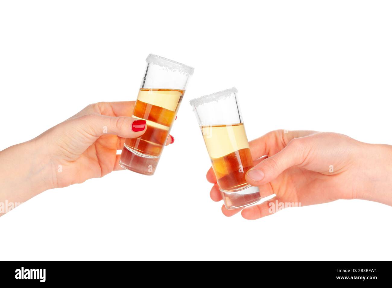 Two hands clinking glasses with shot cocktail isolated on white Stock Photo