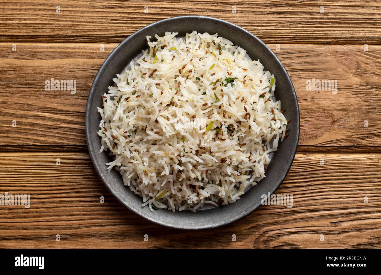 Indian boiled biryani rice with salad with cumin Stock Photo Alamy