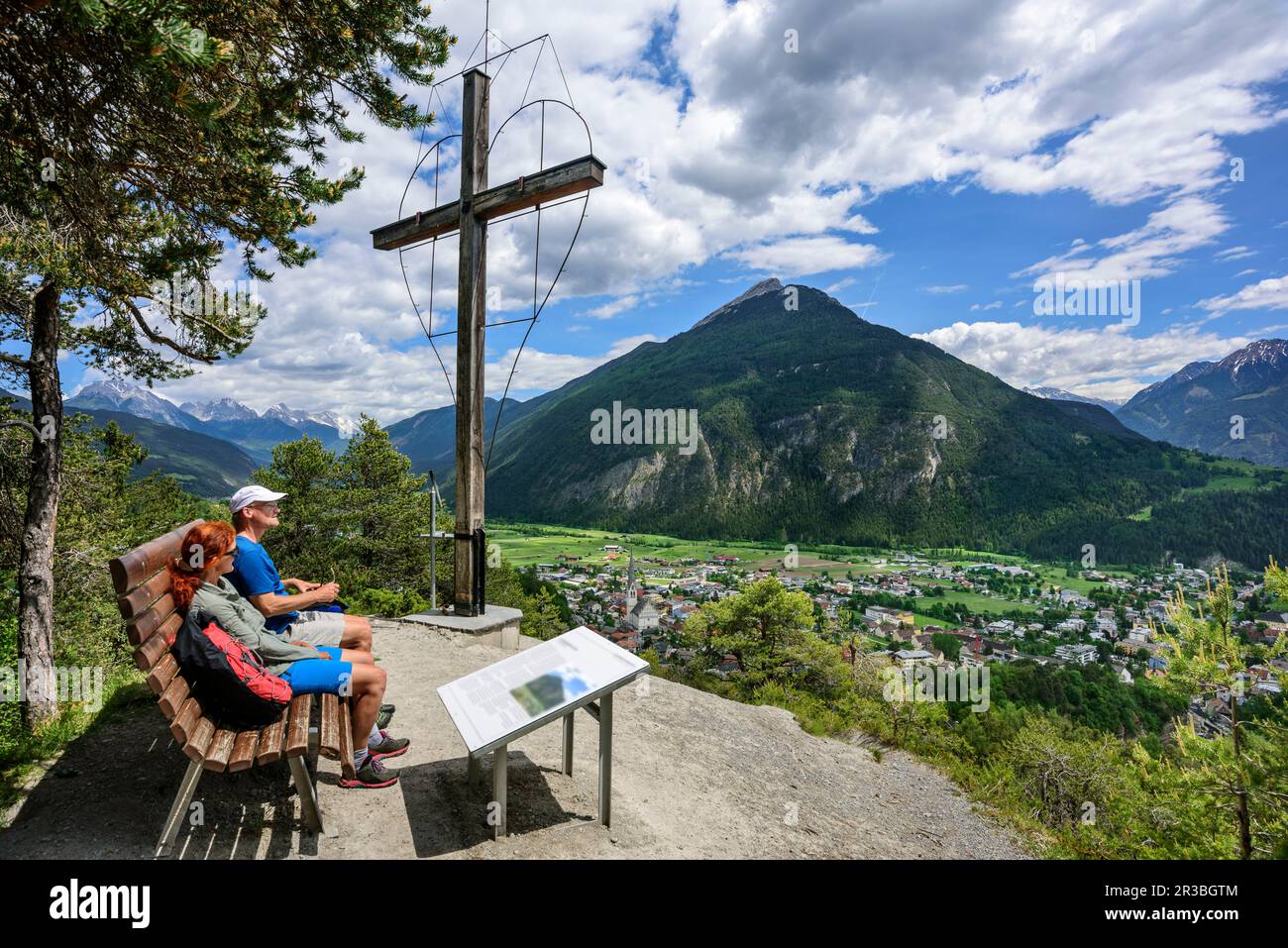 Austria, Tyrol, Imst, Hiking couple taking break at Wetterkreuz observation point Stock Photo