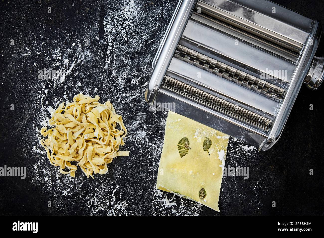Homemade ribbon noodles and lasagne sheets with sage and a pasta