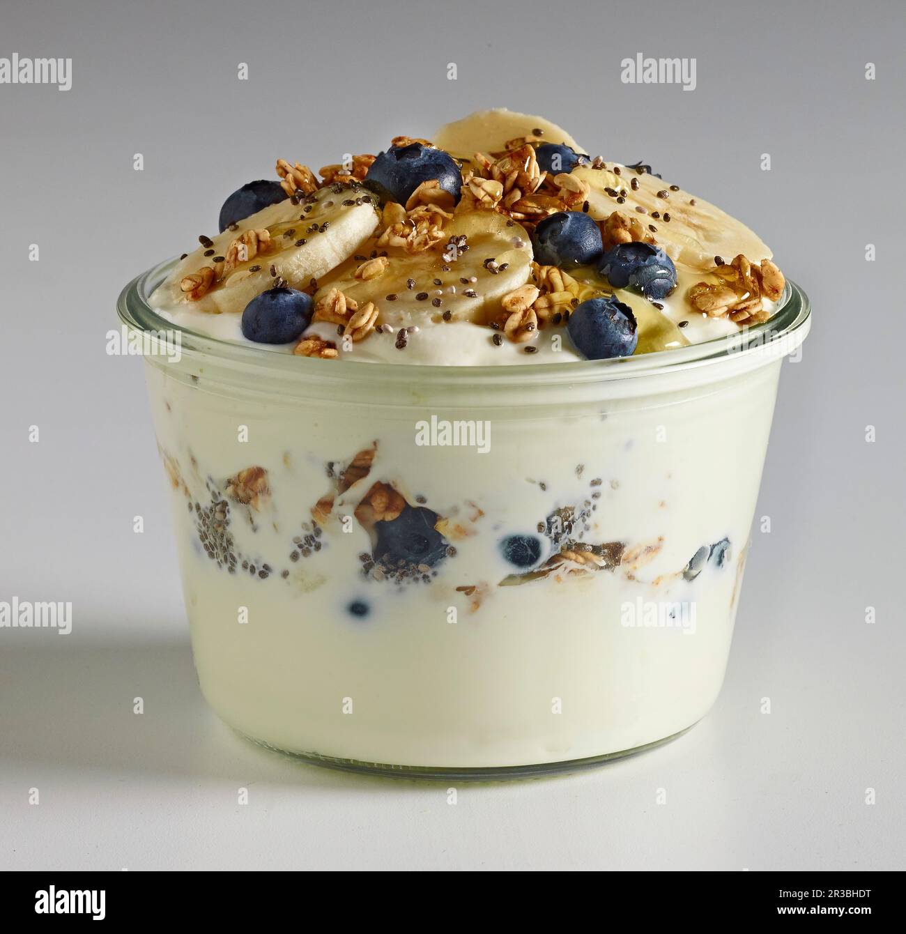 Greek Yoghurt with bluberries, bananas, honey and granola Stock Photo Alamy
