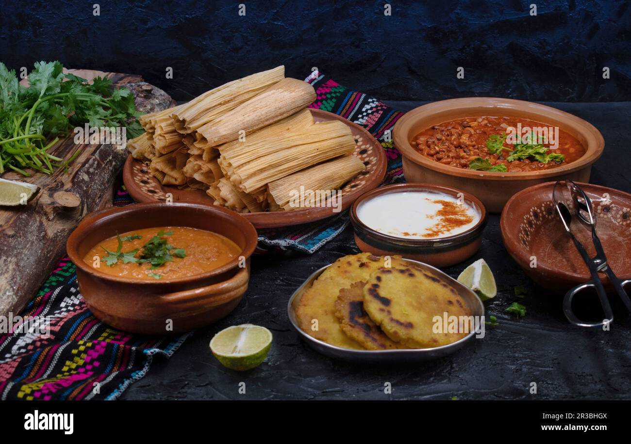 Vegan tamales filled with seitan, masa, chile verde and served with