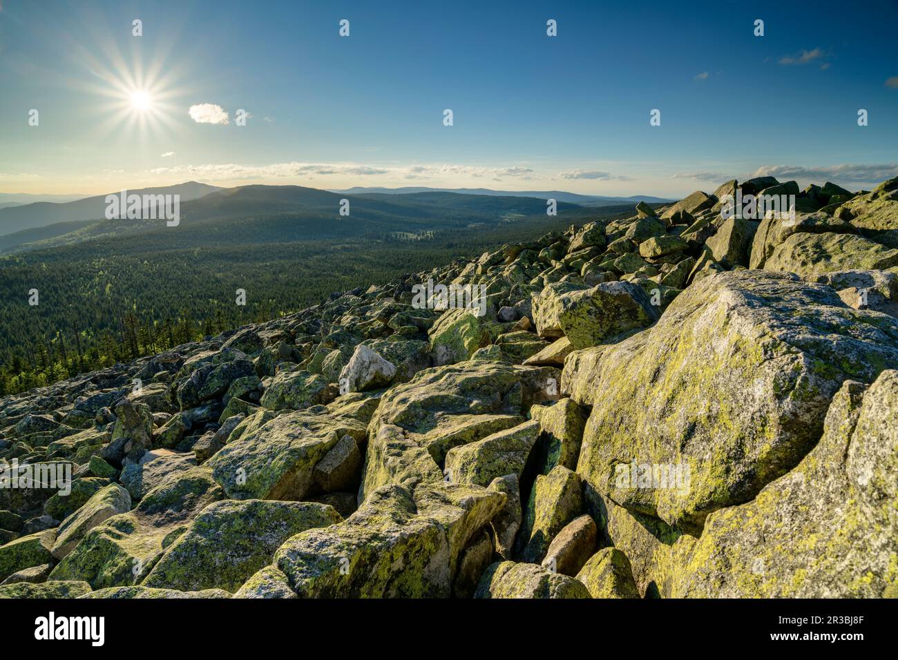 Germany, Bavaria, View from rocky summit of Lusen mountain at sunset Stock Photo