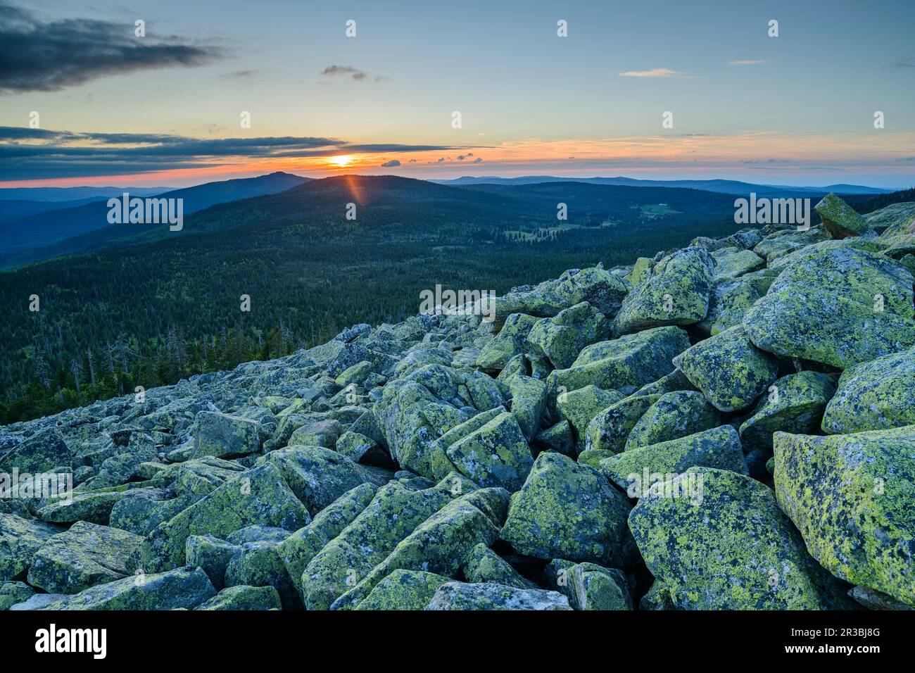 Germany, Bavaria, View from rocky summit of Lusen mountain at sunset Stock Photo