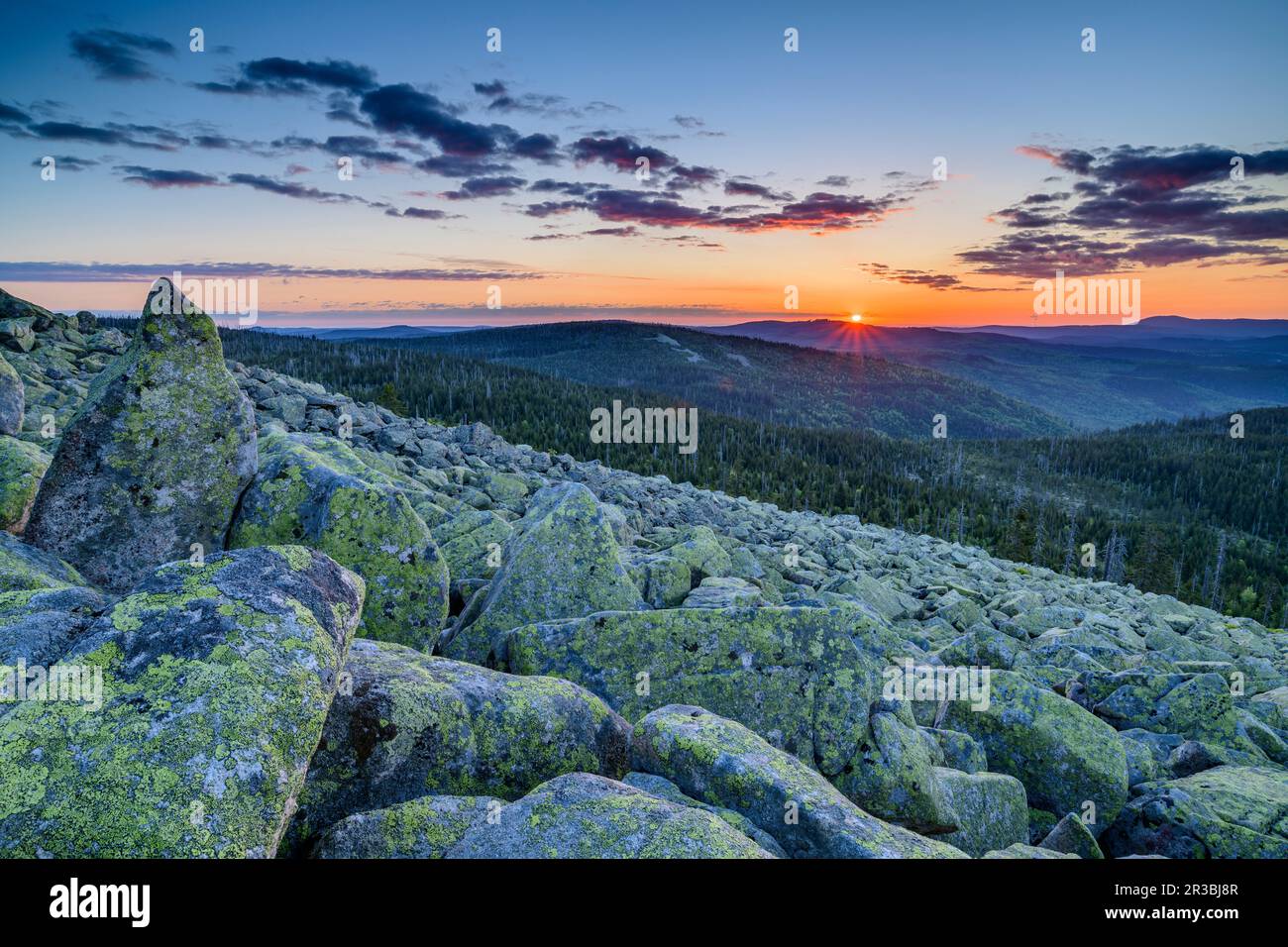 Germany, Bavaria, View from rocky summit of Lusen mountain at sunset Stock Photo