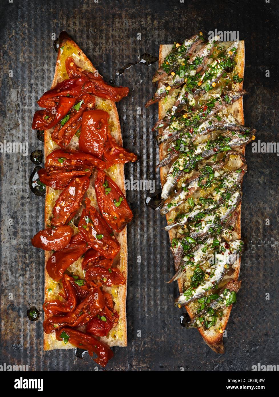 Tomato and anchovy baguette Stock Photo Alamy