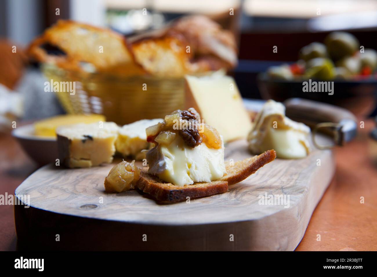 Cheese board with quince chutney Stock Photo Alamy