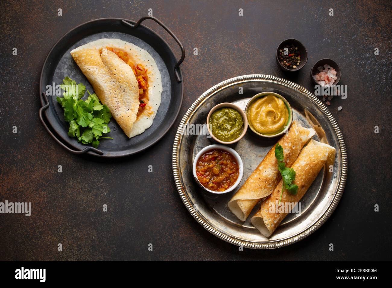 Traditional Indian rice pancakes Dosa with different dips chutney and seasonings Stock Photo Alamy